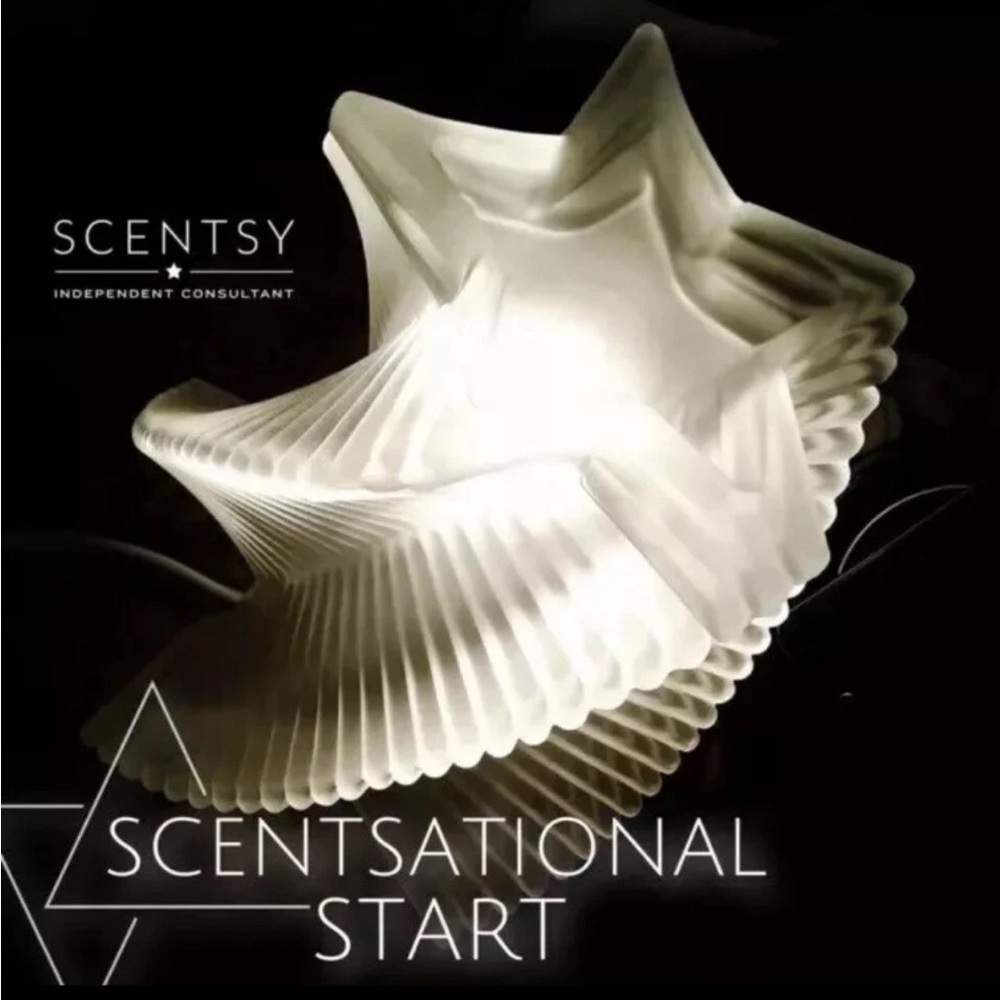 Scentsy Radiant Star Warmer in White New in box.